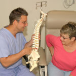 doctor and patient discussing back pain